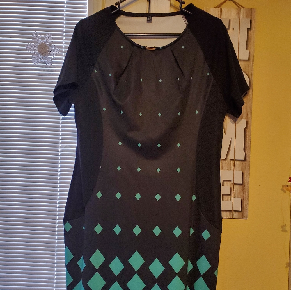 Black dress w/green geometric patterns